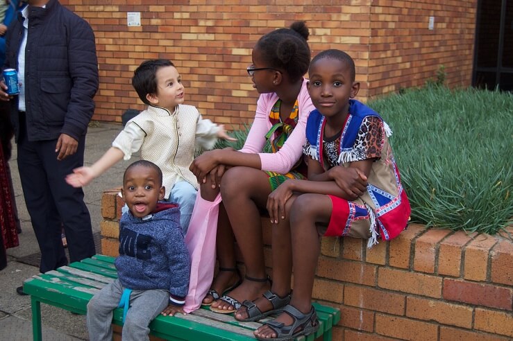Johannesburg - The celebration was on October 22 nd at the Wits Linder Auditorium, with about 750 guests in
	attendance, including Baha’is and their friends. The MEC for Social Development, Ms Khosa also
	attended. Guest were welcomed by a marimba band. The actual programme included songs by 40
	children, and the Johannesburg Baha’i choir. Prayers were also shared and the film, “Light to the World”
	was viewed. Guests were also treated to a gumboot dance by participants of a junior youth group.