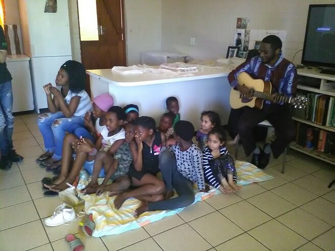 Swartland - This celebration was held on October 22 nd in the home of one of the friends in Lingelethu. In a small
room in a shack with dimensions of 2X3 metres, they were able to fit 25 adults, youth and children. The
actual celebration was very simple; they sang for over an hour together, then one friend shared the
story of Baha'u'llah in isiXhosa and they followed it with simple refreshments. It was a celebration filled
with a beautiful spirit. One of the guests remarked, “I really enjoyed the celebration. Baha'u'llah has
really helped us to learn how to serve our communities”